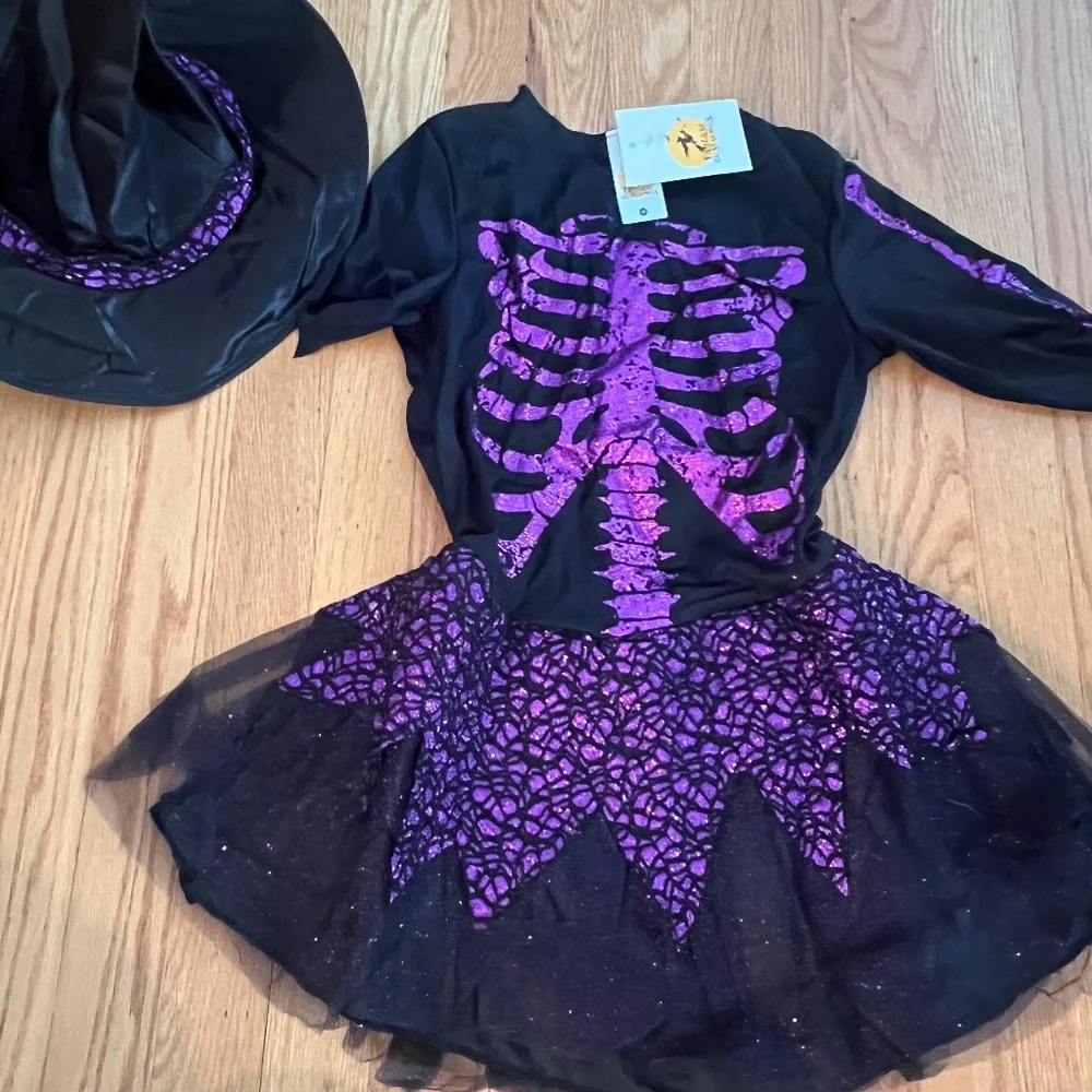- purple glitter and black witch costume